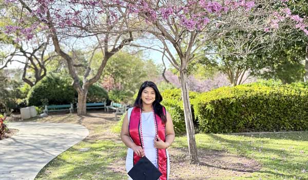 Sakshi Dudhal in SDSU graduate regalia